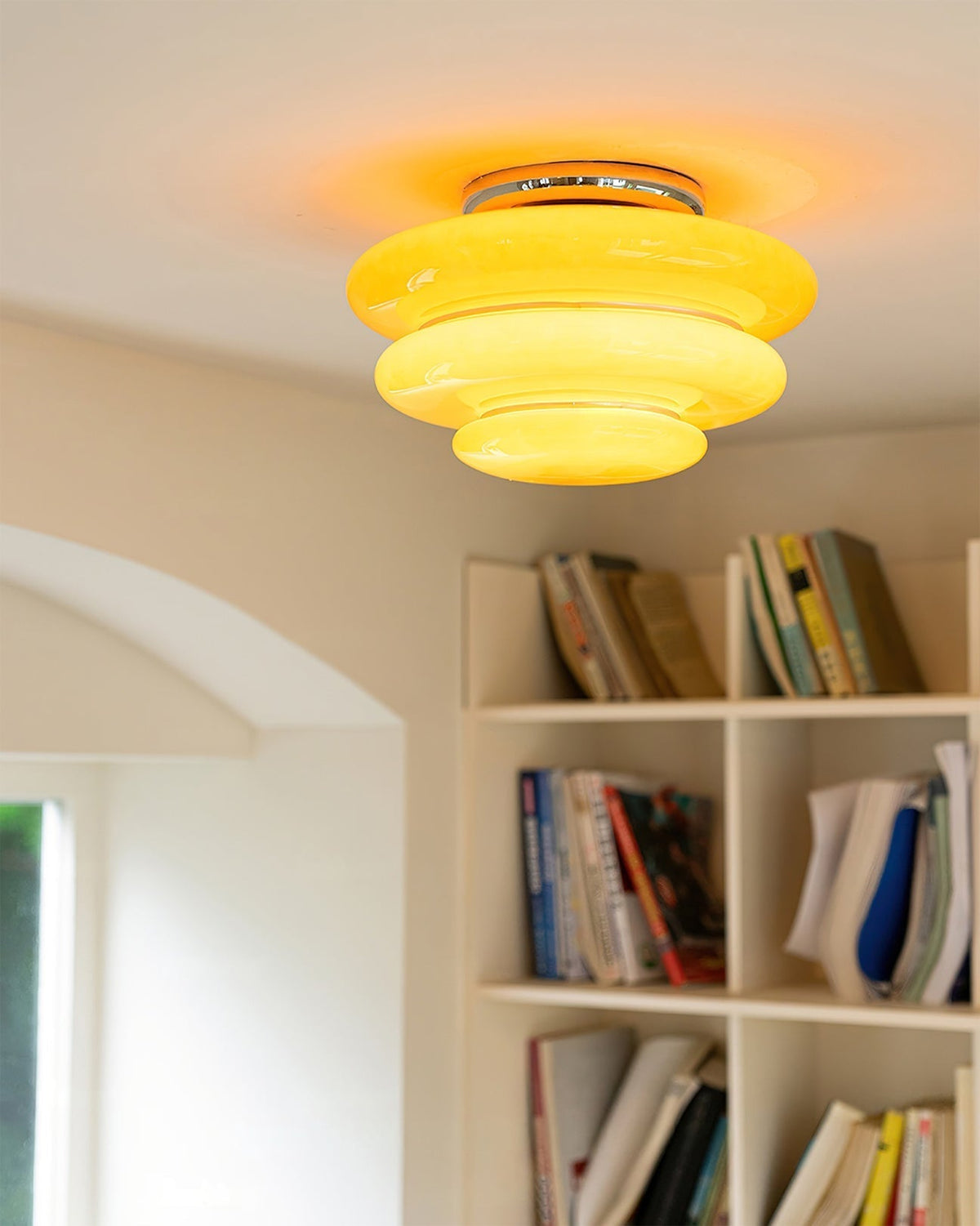 Gispen Orange Ceiling Light viewed from below, highlighting its circular form.