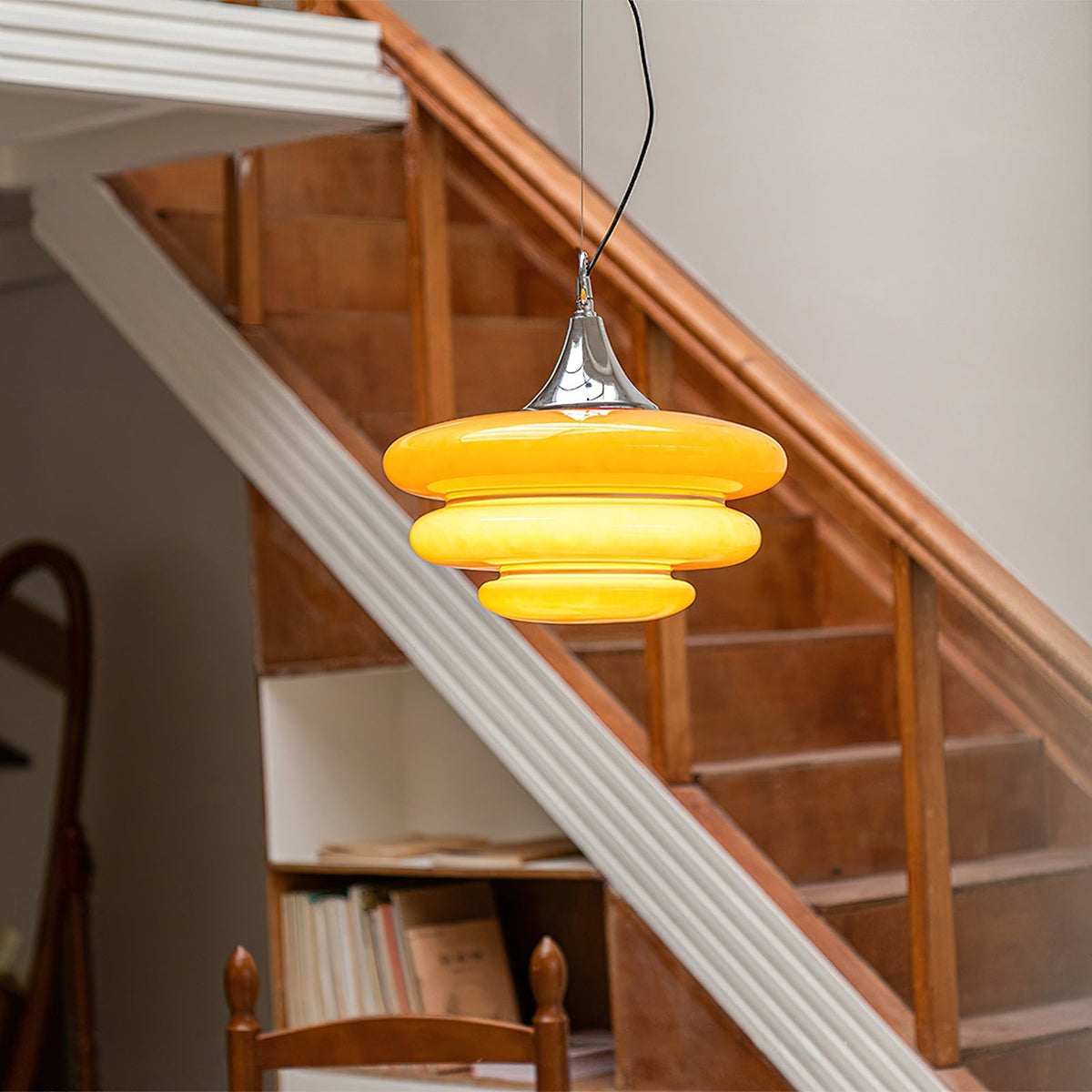 Close-up of the Gispen Orange Pendant Light showing the glossy glass finish.
