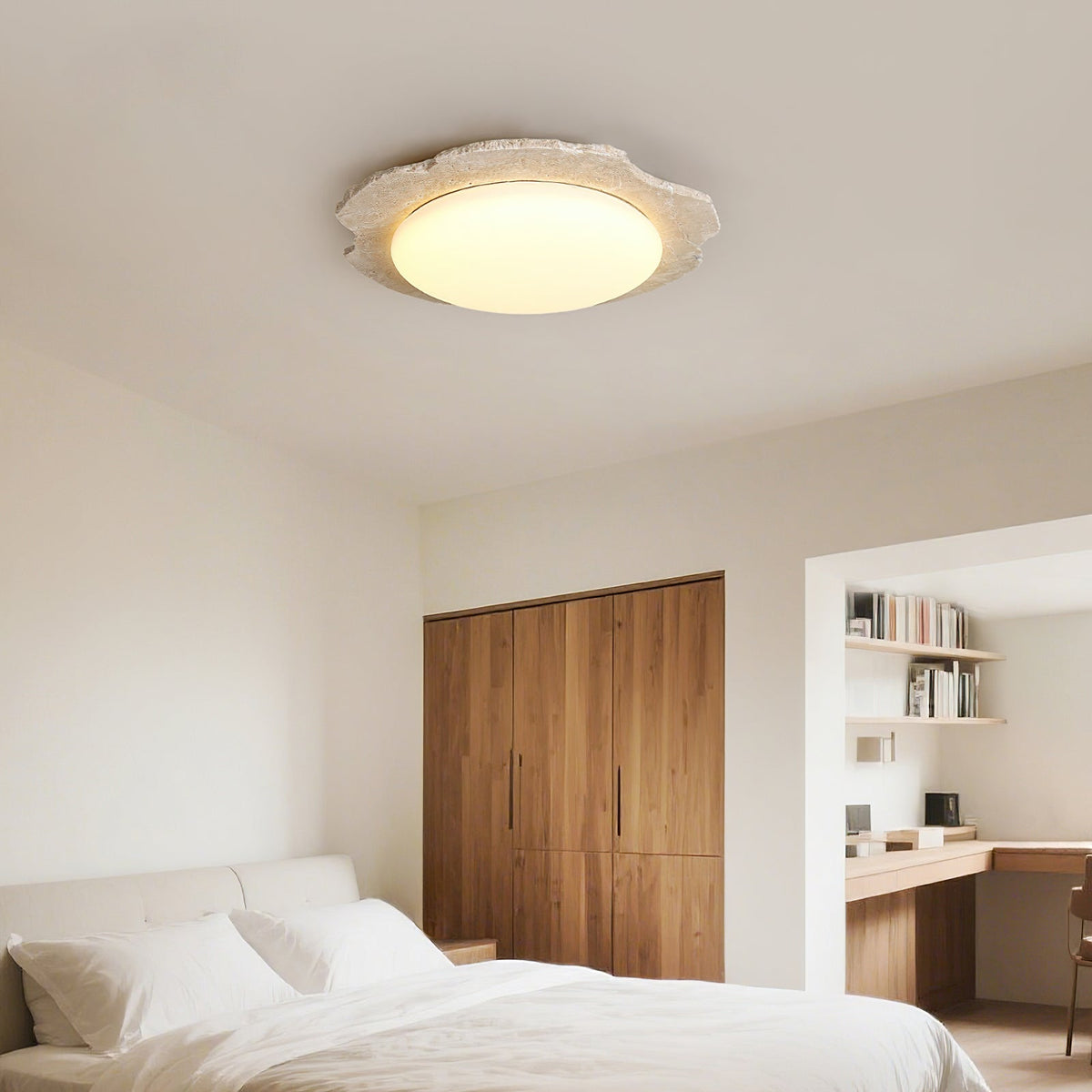 Close-up of the Gracie Ceiling Light's natural travertine texture.