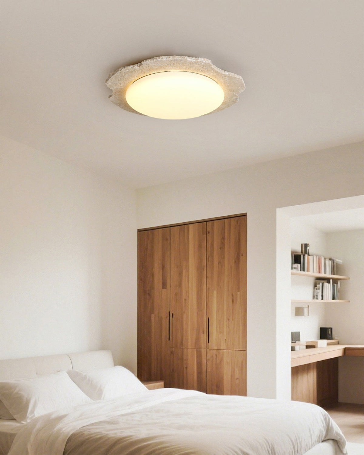 Lifestyle image of the Gracie Ceiling Light in a minimalist bedroom.