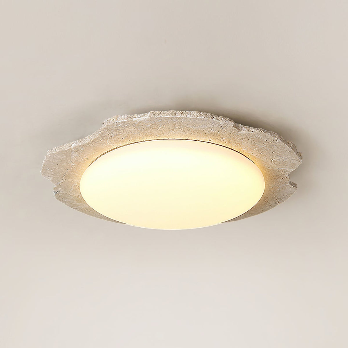 Gracie Ceiling Light illuminated in a modern living room setting.