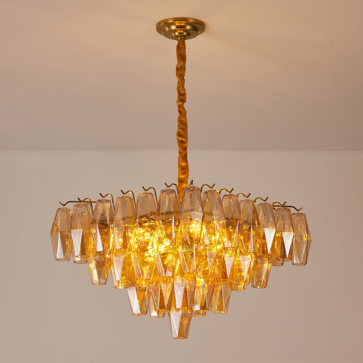 The chandelier in a formal dining room setting.