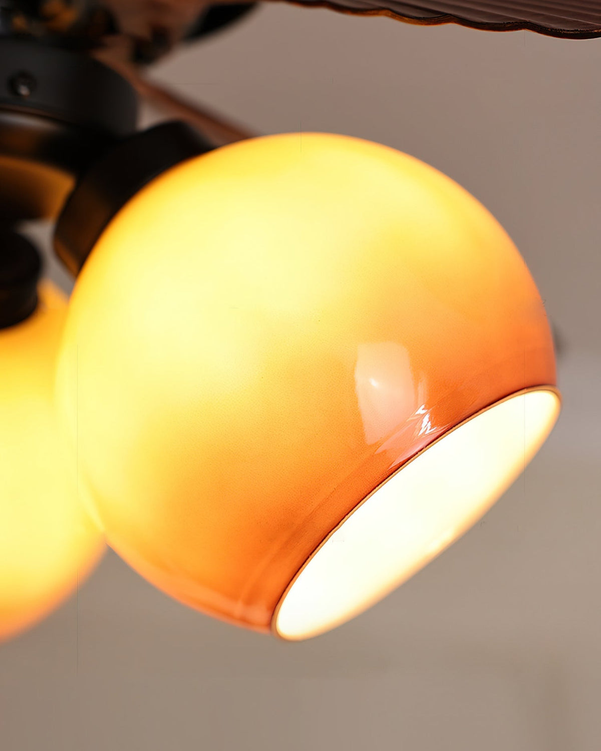 Close-up of the glass shade covering the light bulb.
