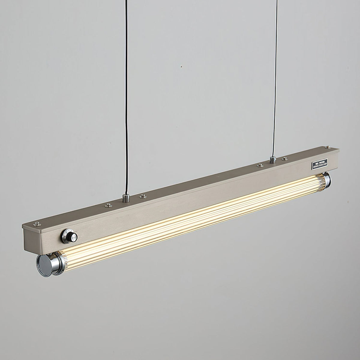Hiromi Chandelier providing task lighting over a kitchen island.