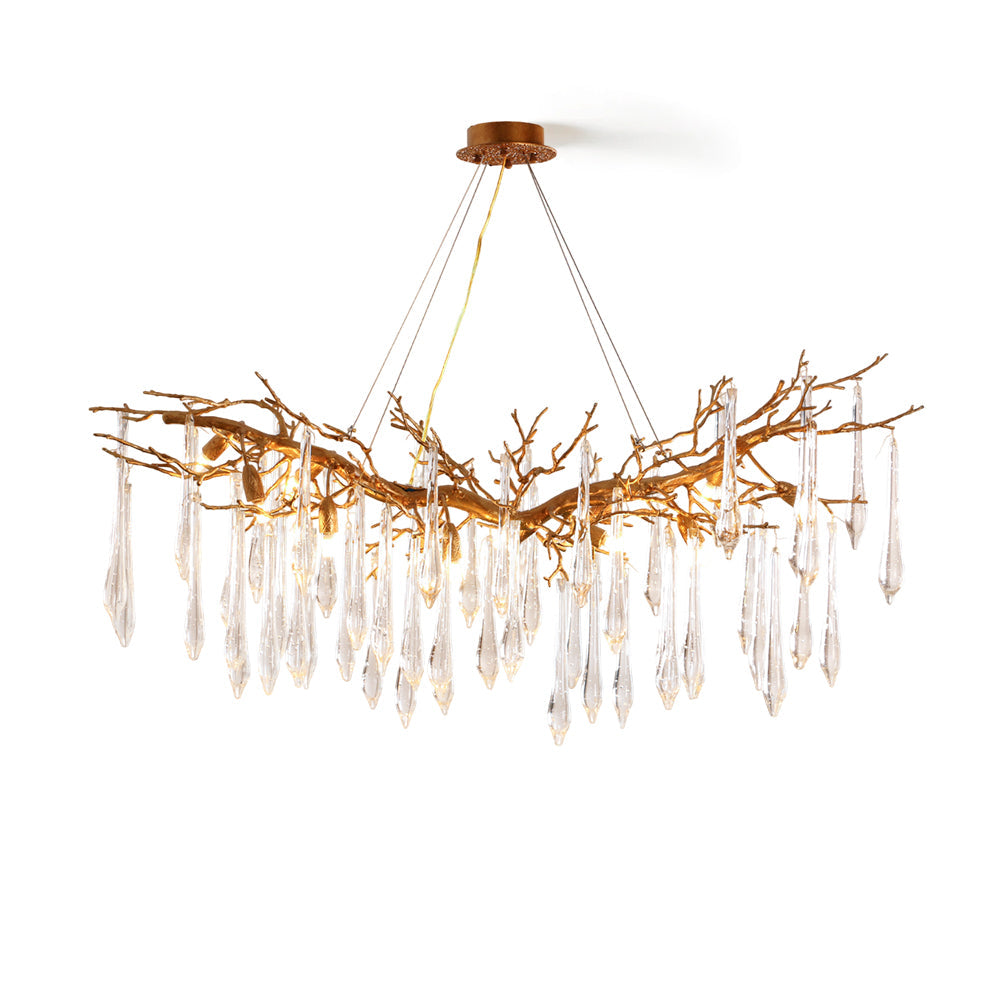 Janae Chandelier with brass arms and glass shades, viewed from the front.