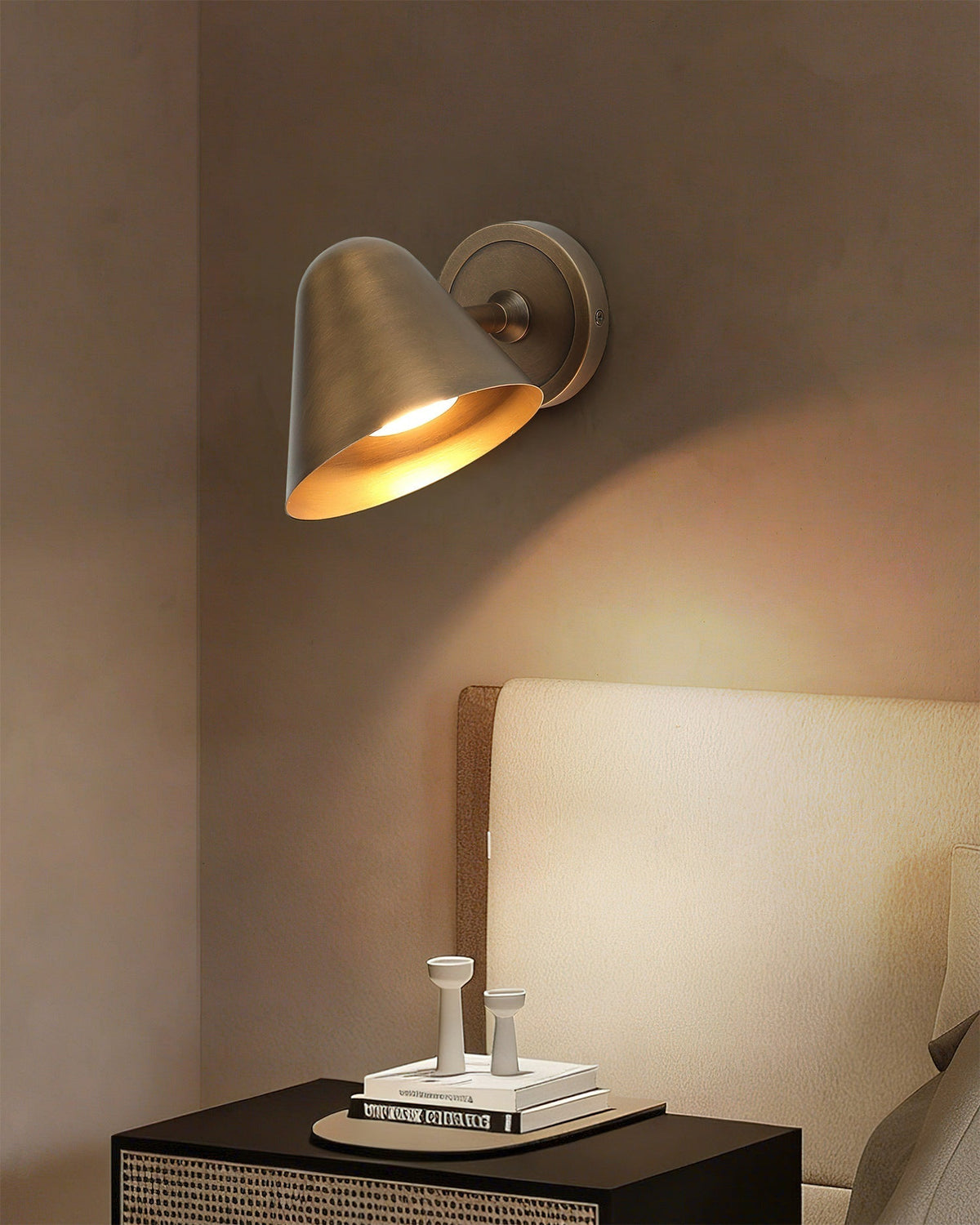 Lifestyle image of the Janna Wall Lamp in a contemporary hallway.