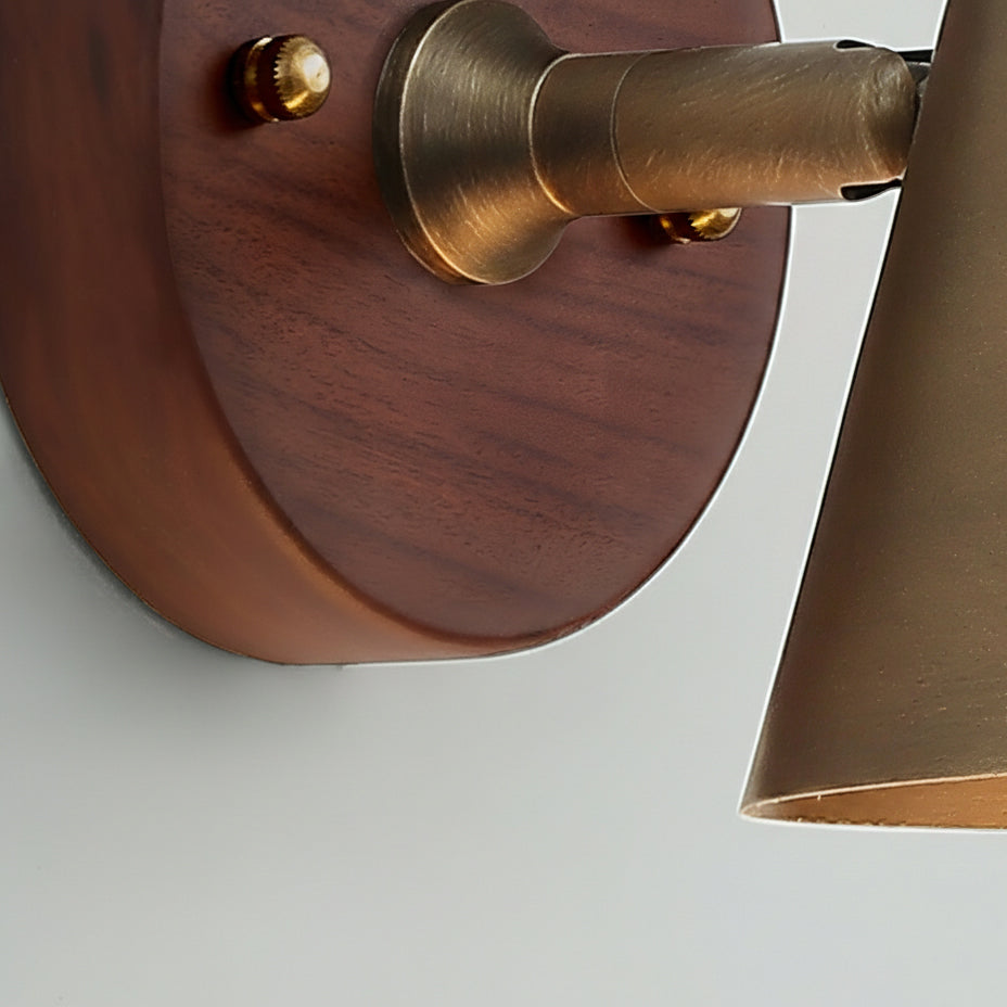 Detailed view of the Janna Wall Lamp's mounting plate and body.