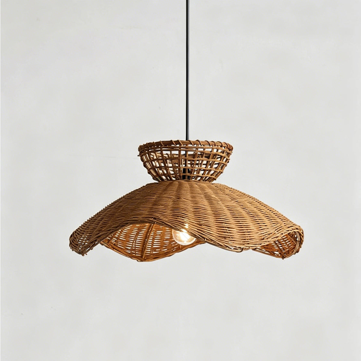 Angled view of the single-light Jumbo Pendant Light, highlighting its woven texture.