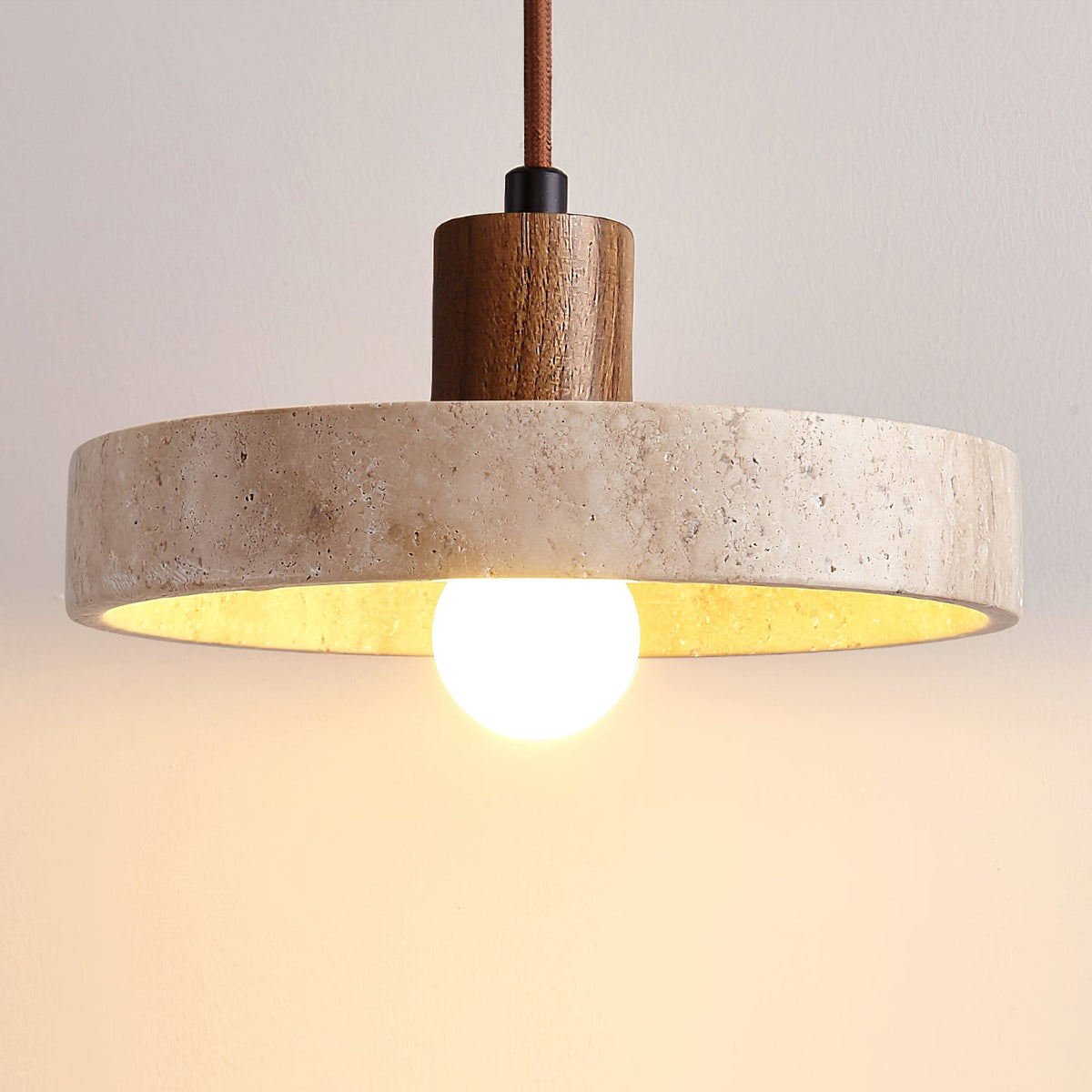 The two-light Kairi Pendant Lamp in a beige and wood finish.