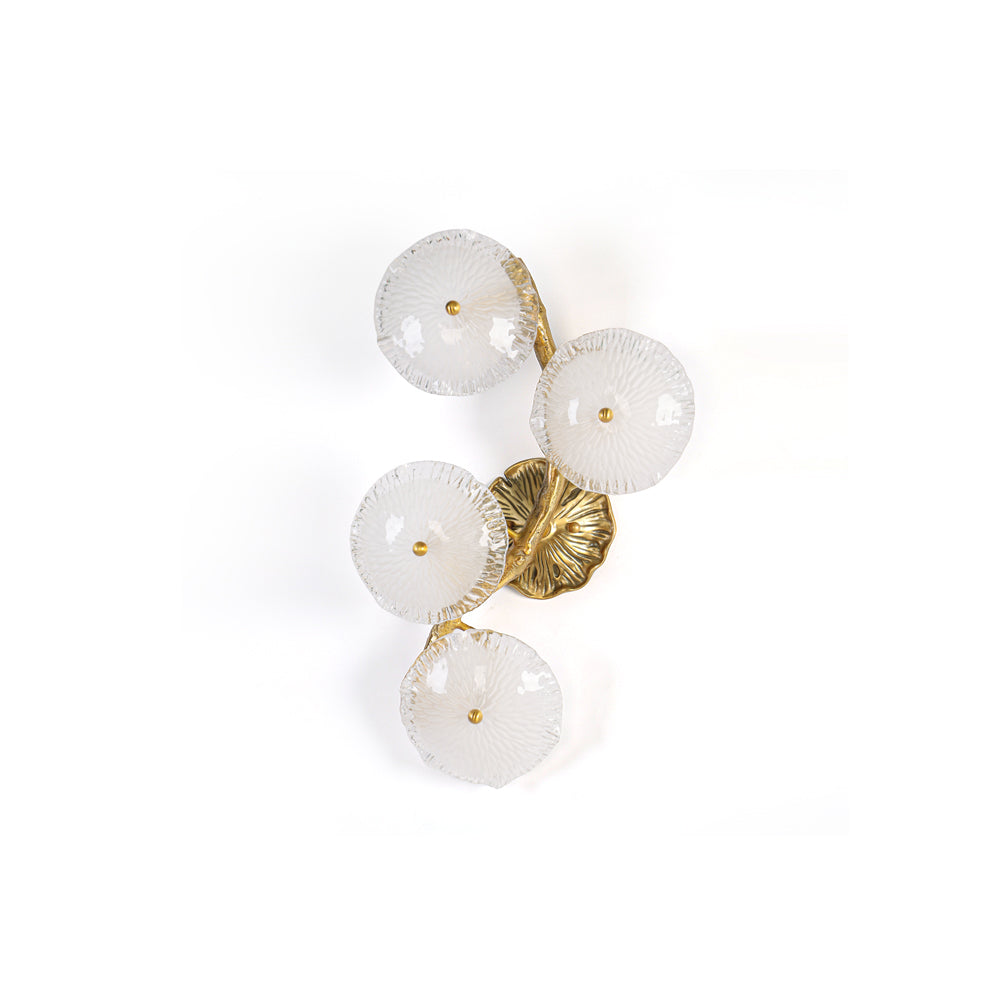 Kamal Wall Lamp with brass branch and four lotus leaf glass shades.