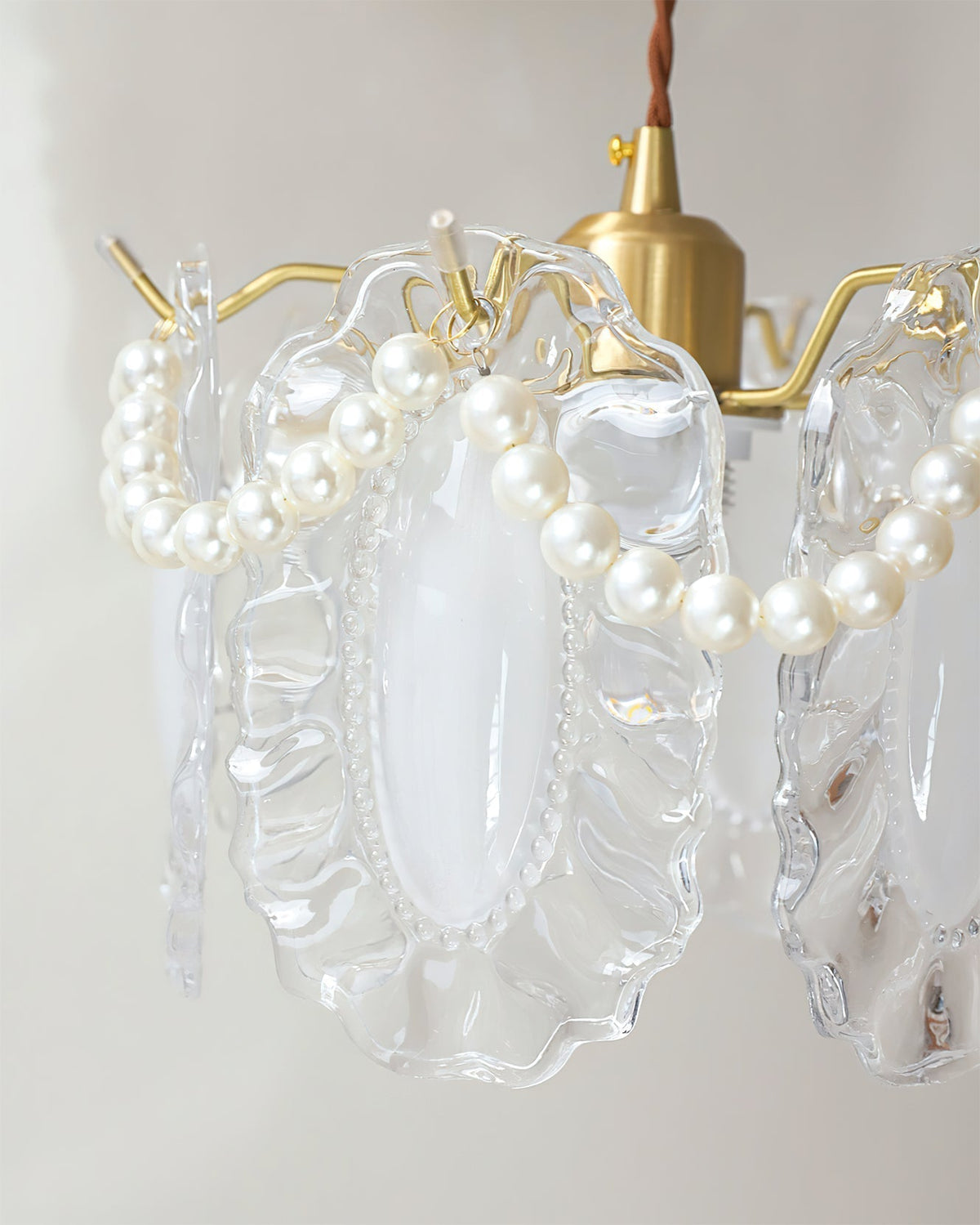 Kano Glass Wall Light installed in a hallway, providing ambient light.