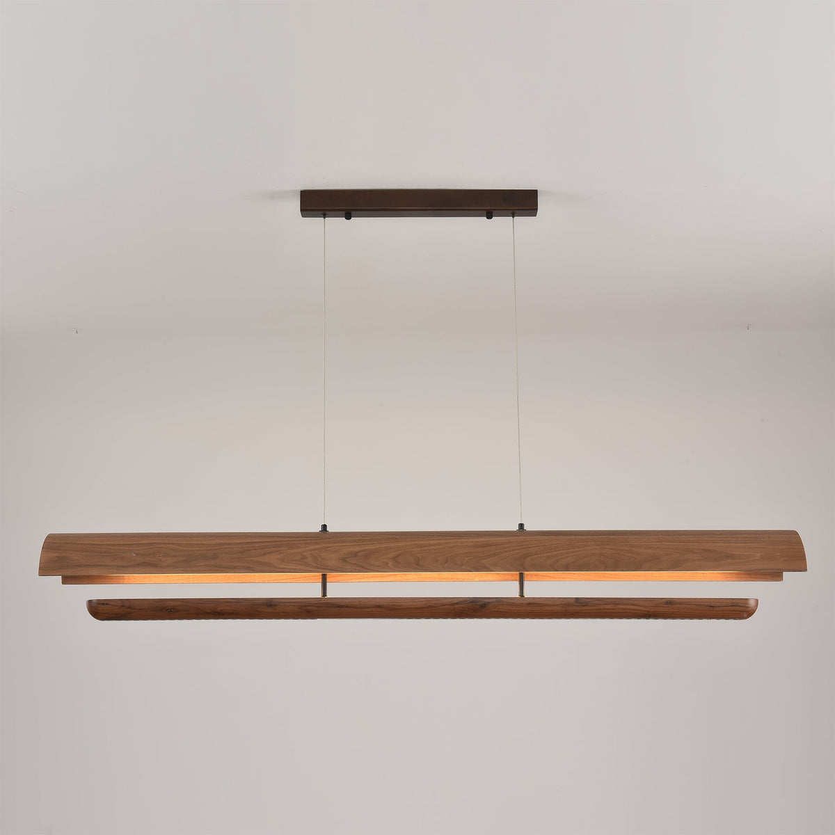 Kanoe Linear Chandelier in a contemporary executive conference room setting.