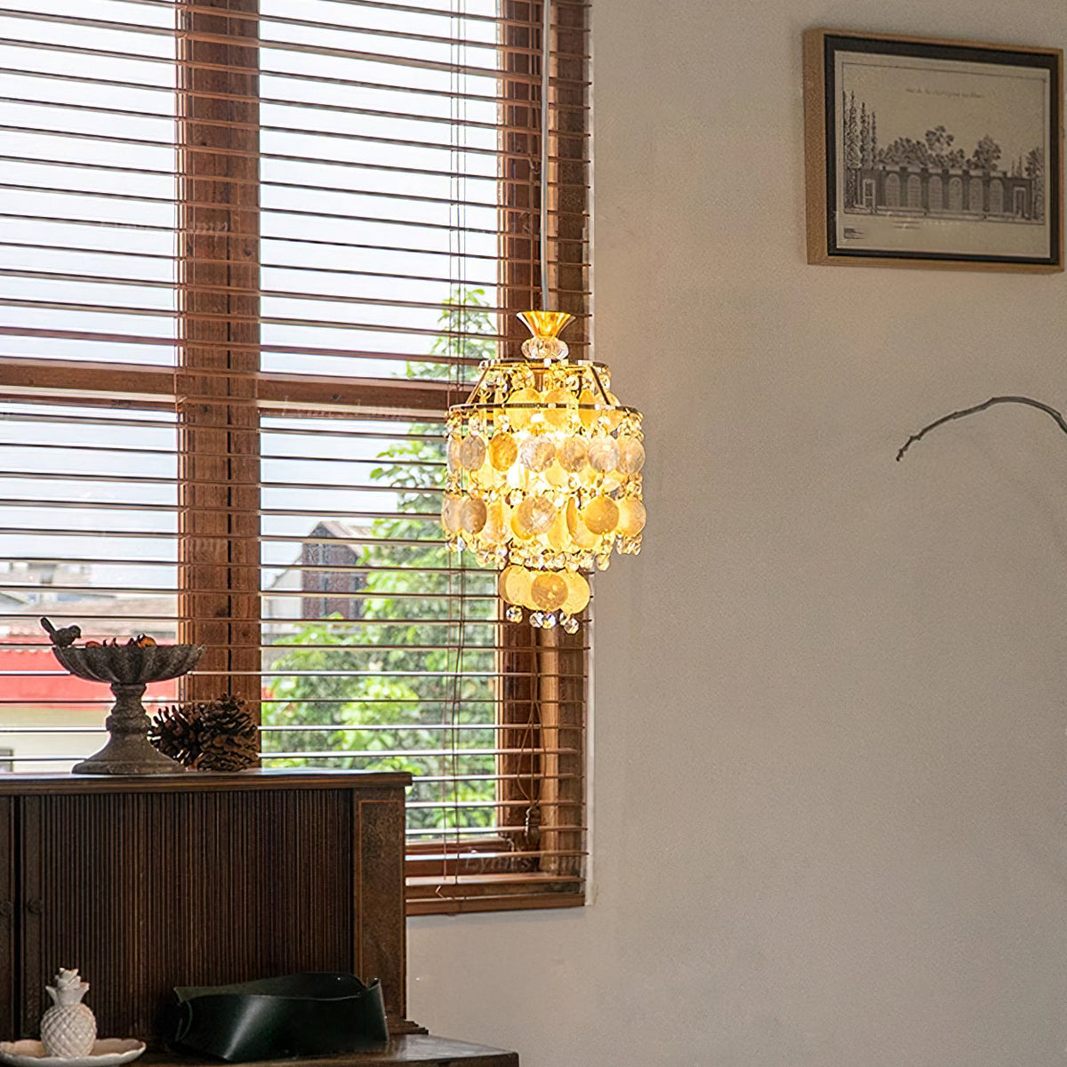 Katinka Pendant Light in a chrome finish, showing its layered design.