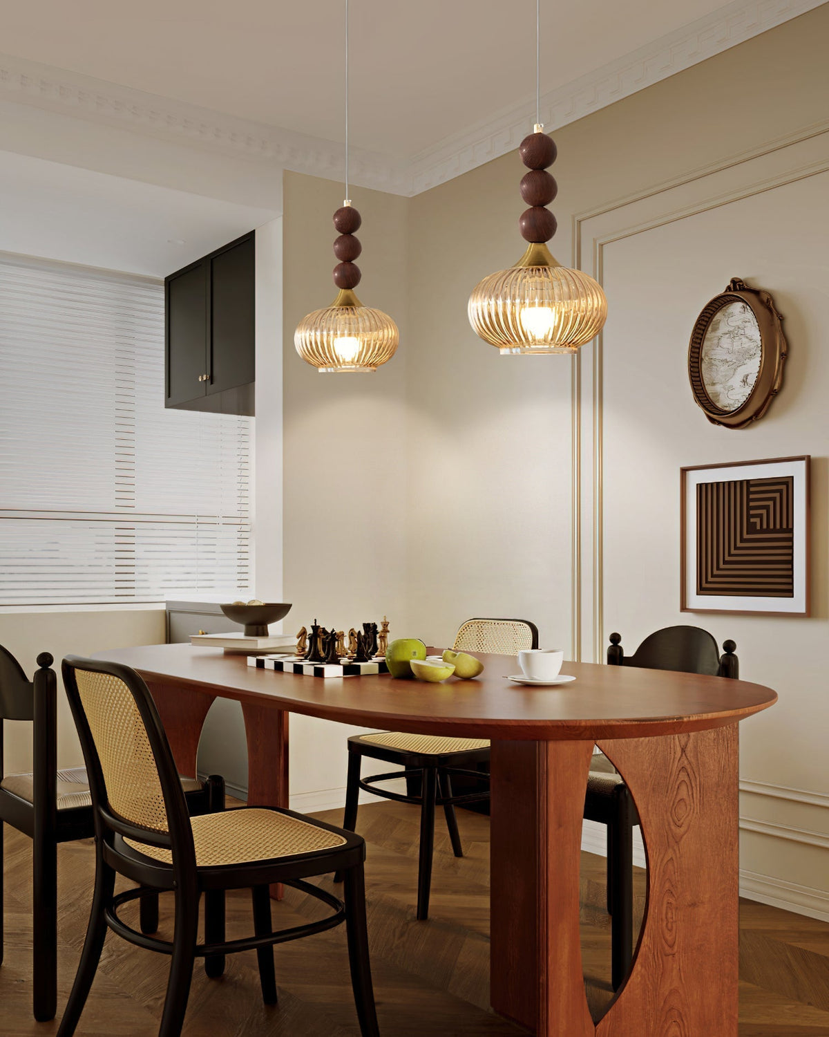 Lifestyle image featuring the Kaydan Pendant Lamp over a dining table.