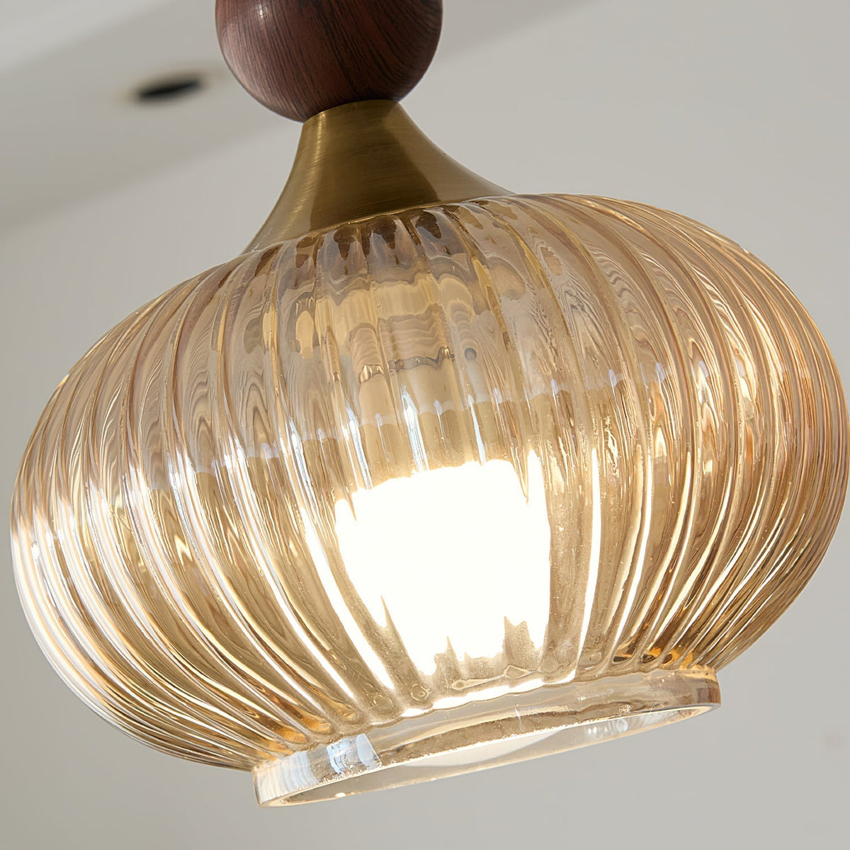 Close-up on the craftsmanship of the metal and glass components.