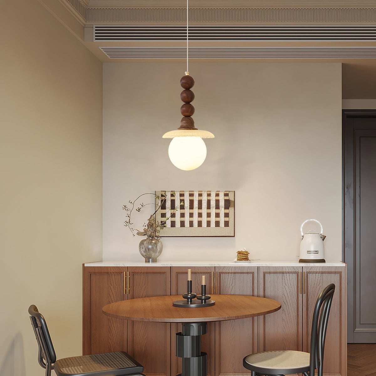 Angled view from below of the amber Kaydan Pendant Lamp.