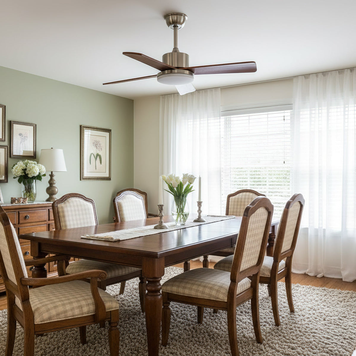 Kendal ceiling fan with its integrated LED light illuminated.