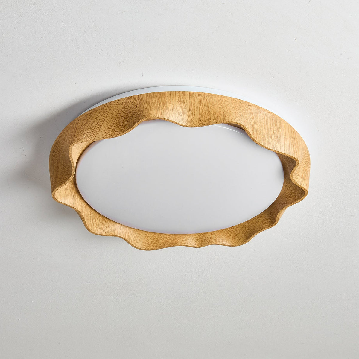 Lifestyle view of the Kerio Ceiling Light illuminating a contemporary living room.