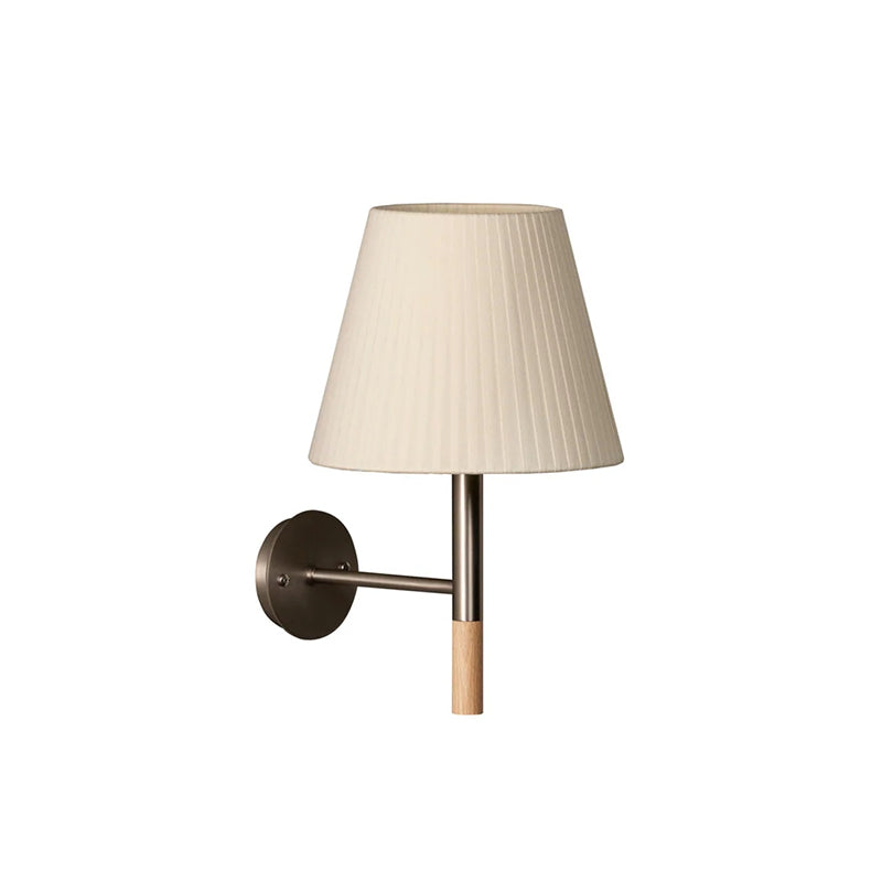 Angled view of the white Kilkee Wall Lamp against a light wall.