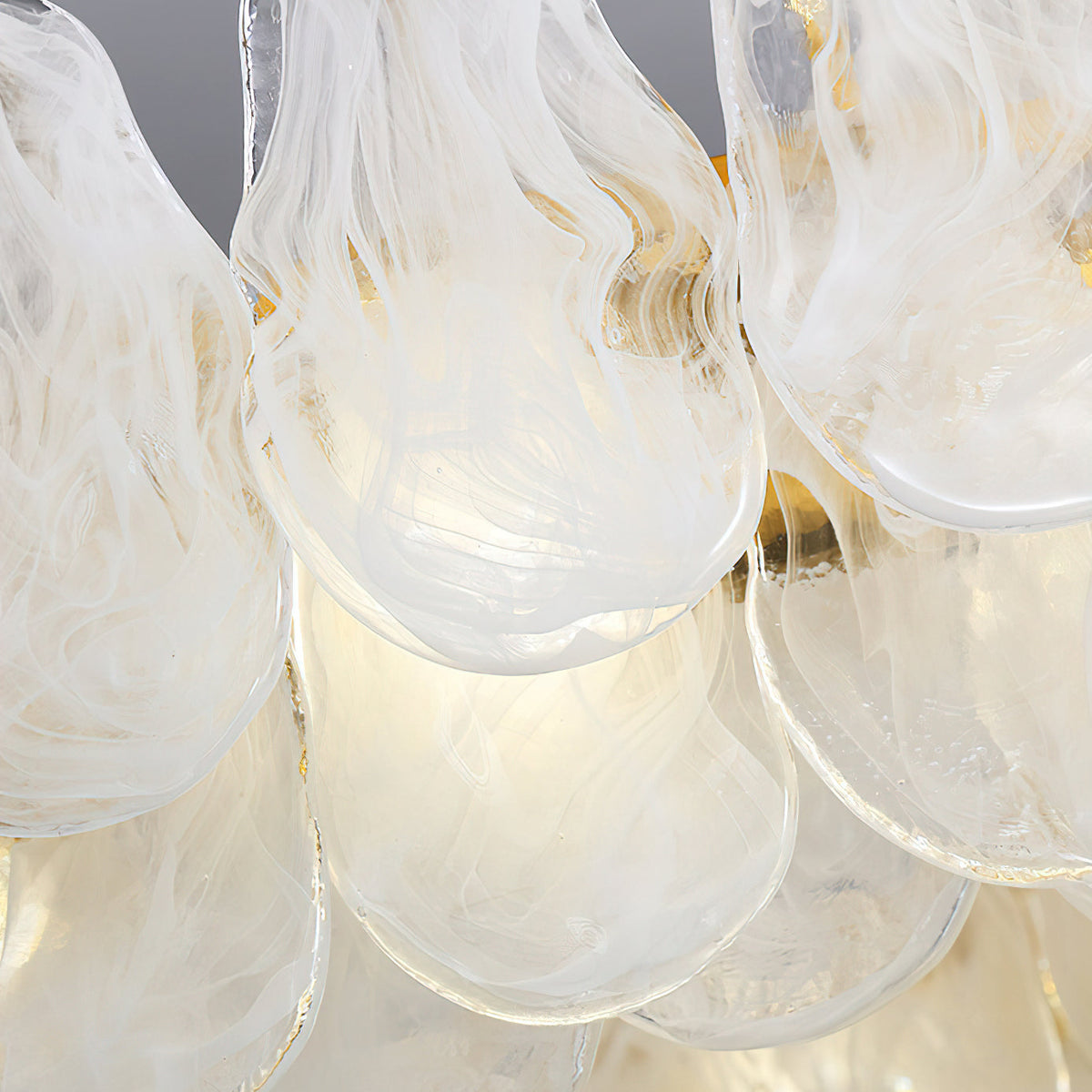 Angled perspective of the Leon Cloud Glass Chandelier against a neutral background.
