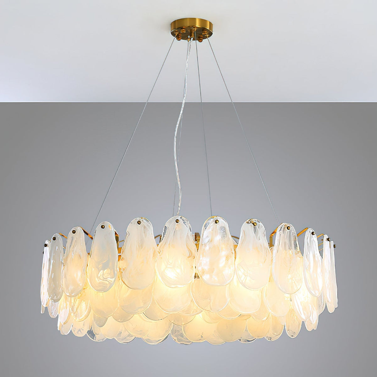 A product shot showing the Leon Chandelier's elegant form and materials.