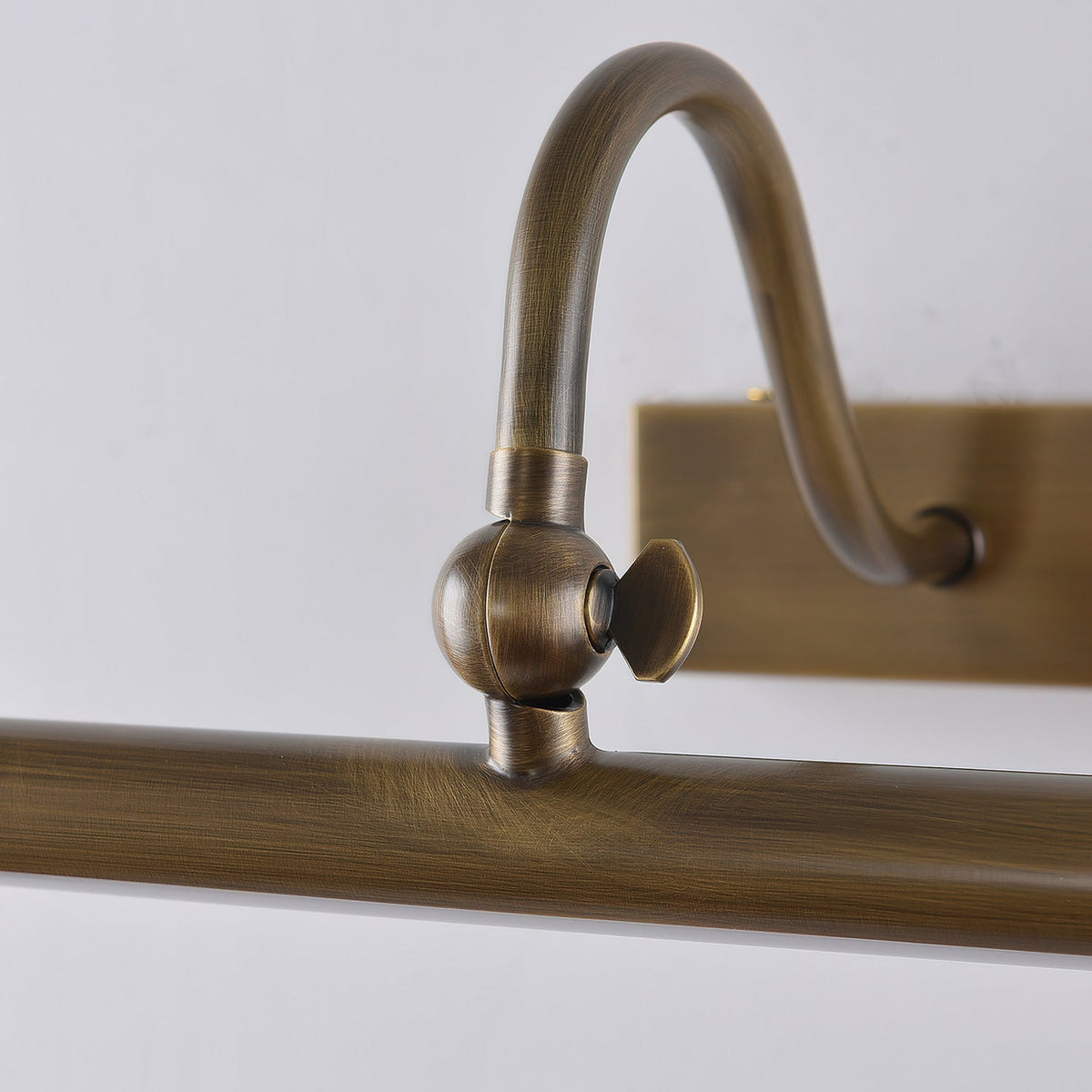 Close-up view of the brushed brass finish on the Kingsbury wall sconce.