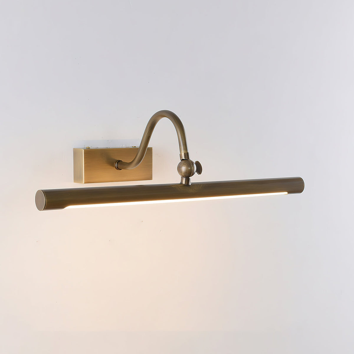 A pair of small Kingsbury sconces used as bedside reading lights.