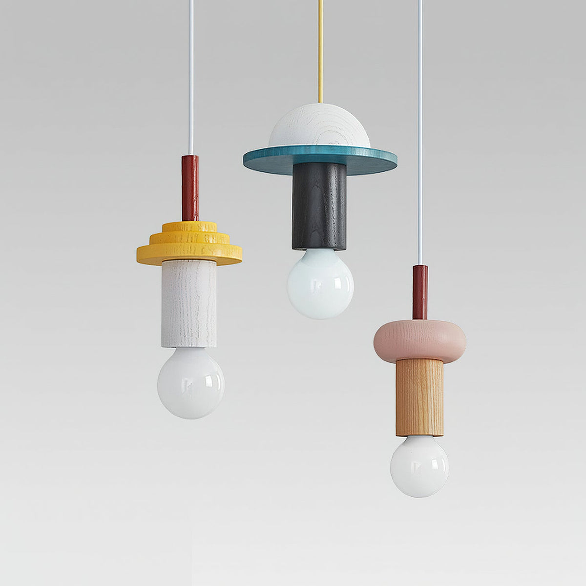 The blue Klee Geometric Pendant Light illuminating a reading corner.