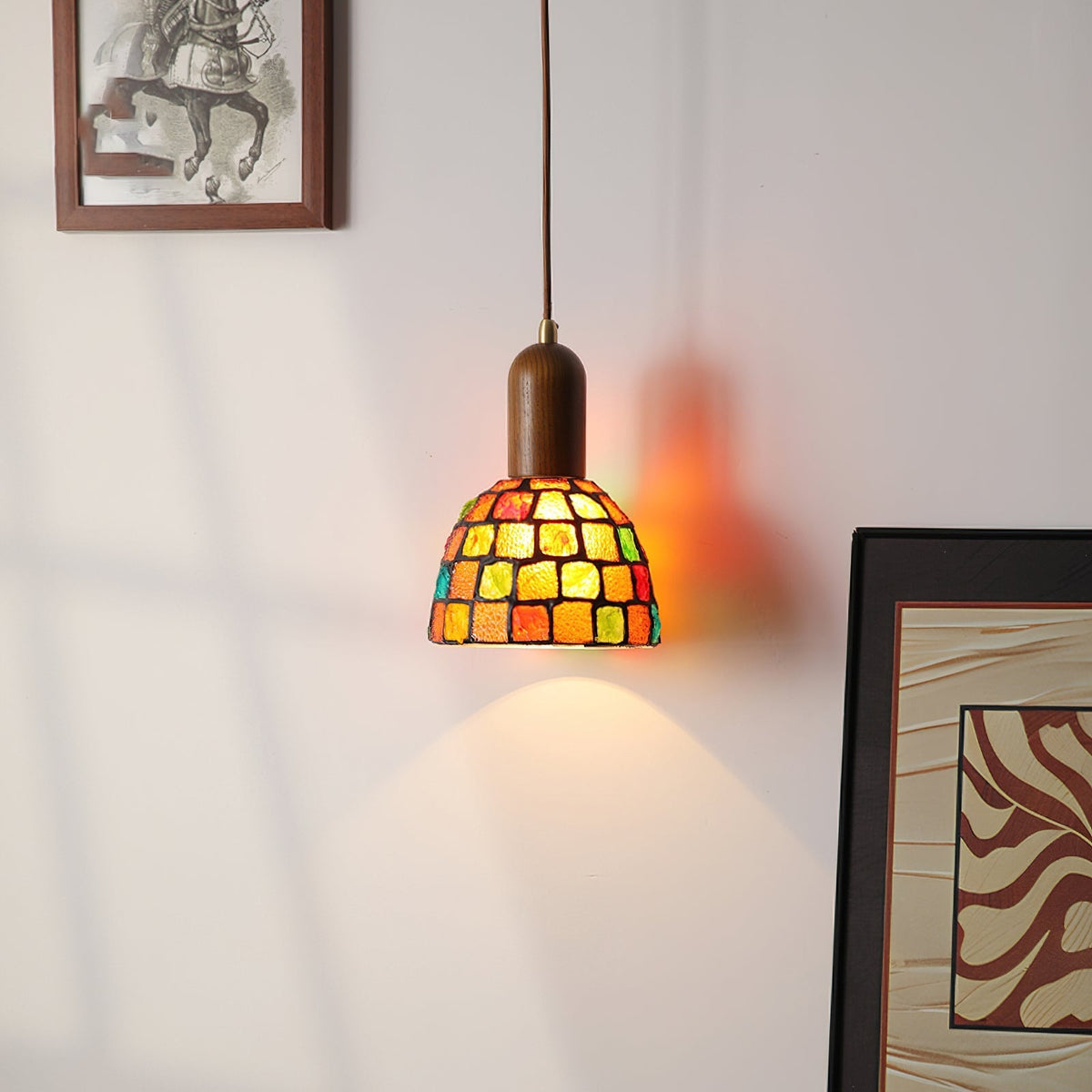 The single Klima Pendant Light illuminating a cozy living room corner.