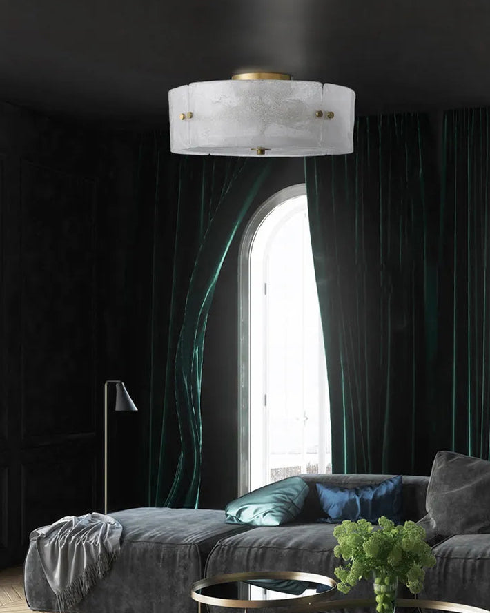 Kora flush mount installed on a ceiling in a stylishly decorated room.