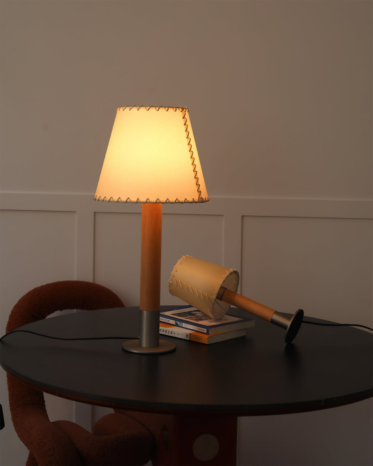 Close-up of the in-line push-button switch on the lamp's cord.
