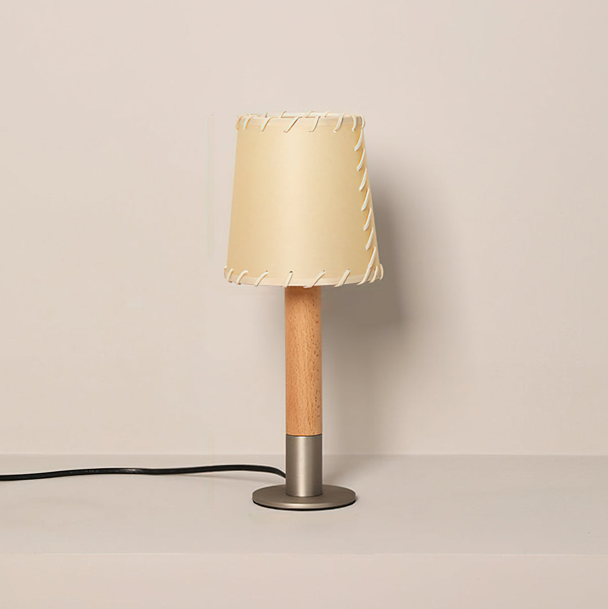 The lamp shown with a vintage-style Edison bulb.