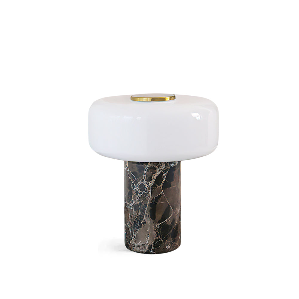Close-up on the unique veining pattern of the natural marble base.