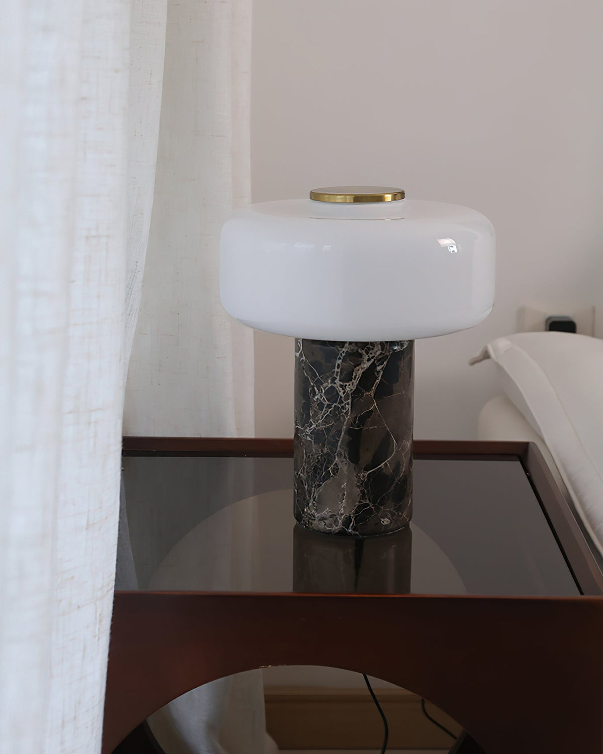 Detailed shot of the translucent mushroom-shaped glass diffuser shade.