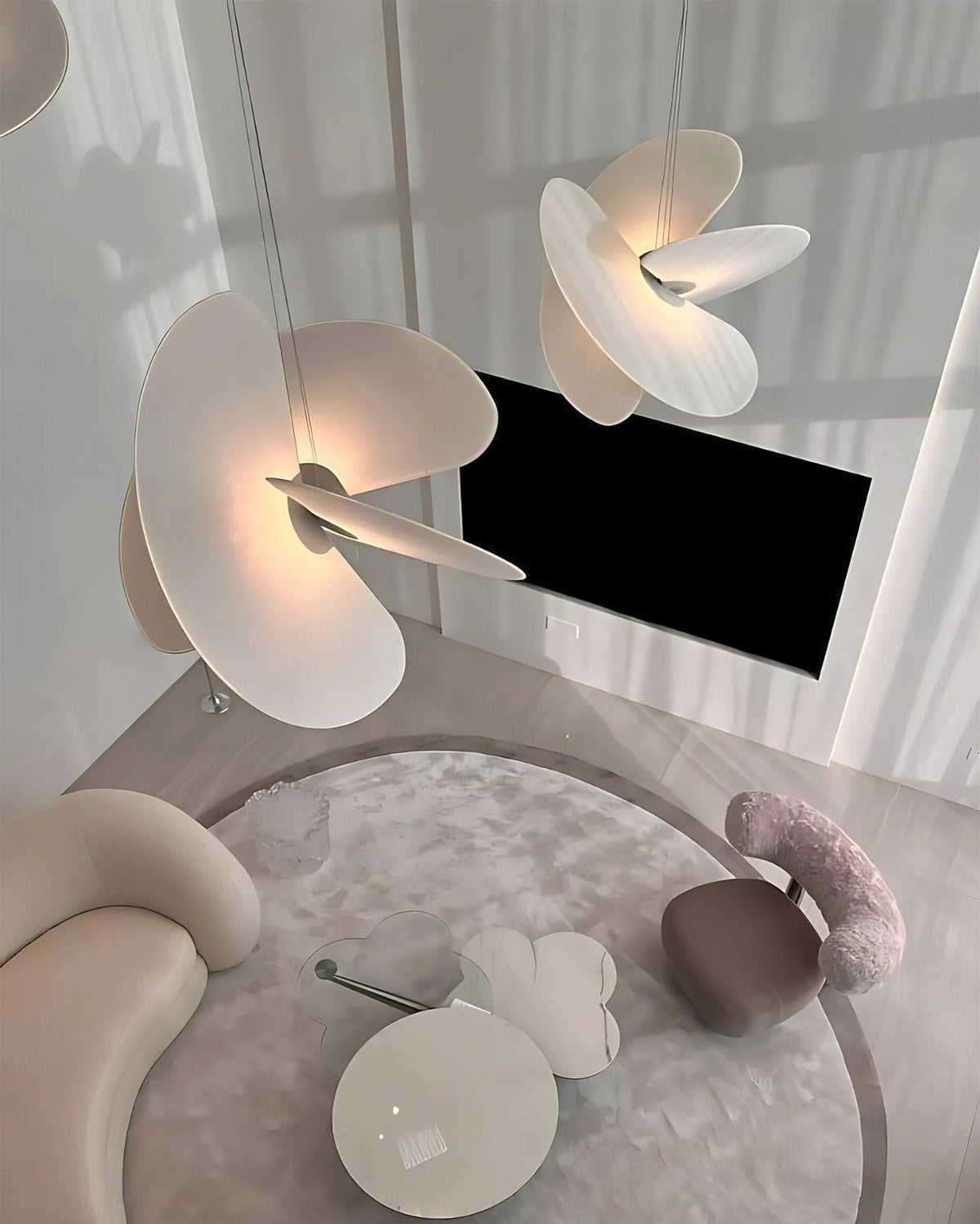 Detail of the metal ceiling mount and suspension wire for the Levante Pendant Light.