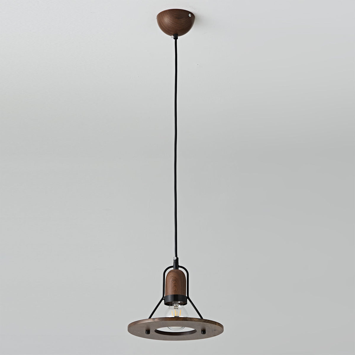 Lioren Pendant Lamp hanging over a kitchen island.