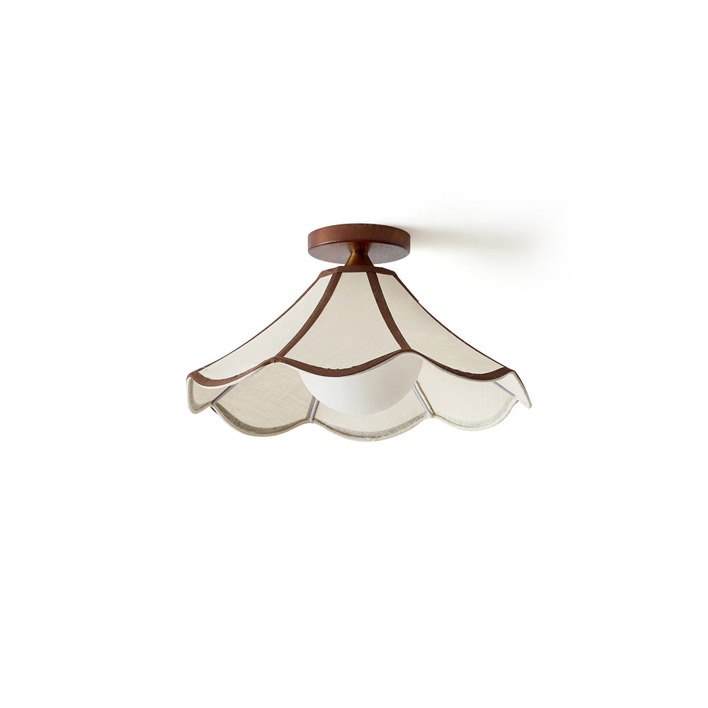Lonzo Ceiling Light with beige fabric shade and wood accent.