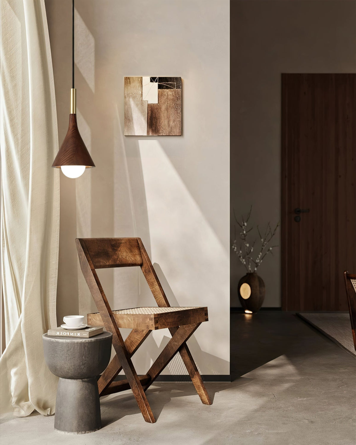 Lucian Pendant Lamp in a sleek black finish.