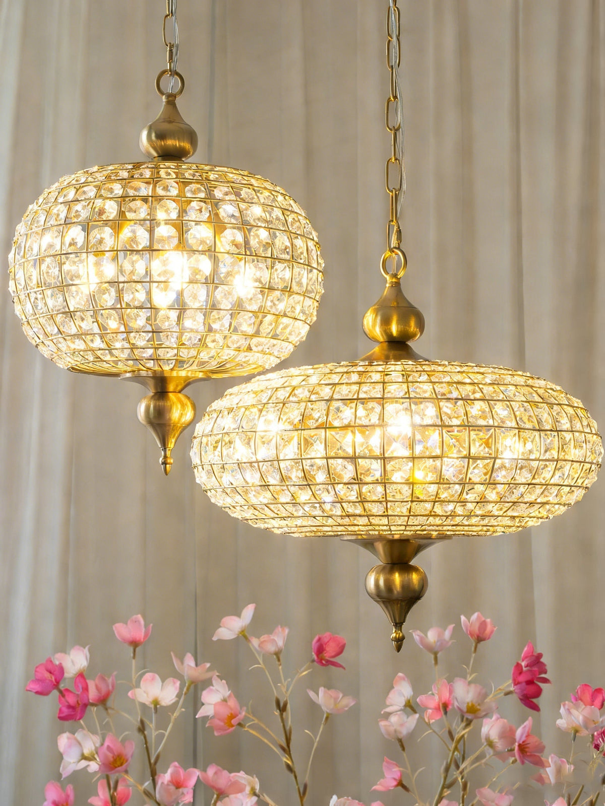 Lifestyle image showing the scale of the larger Lucille pendant light.
