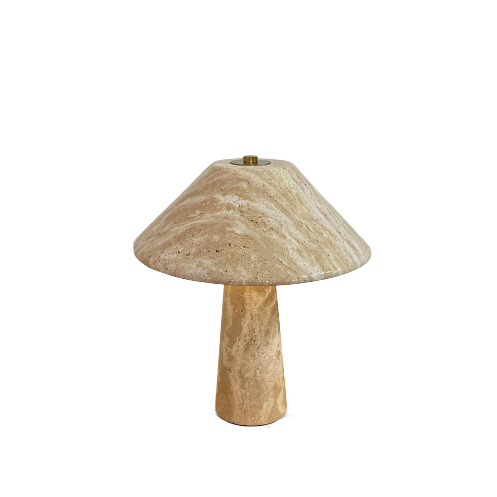 Lydia Table Lamp with its sculptural travertine base and beige finish.