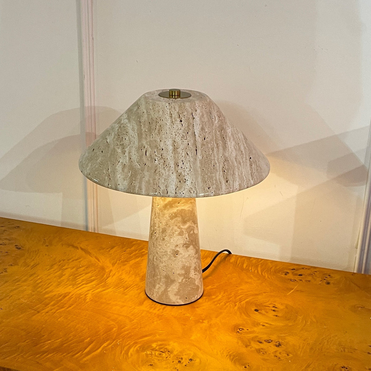 Side view of the Lydia Table Lamp, highlighting its simple form.