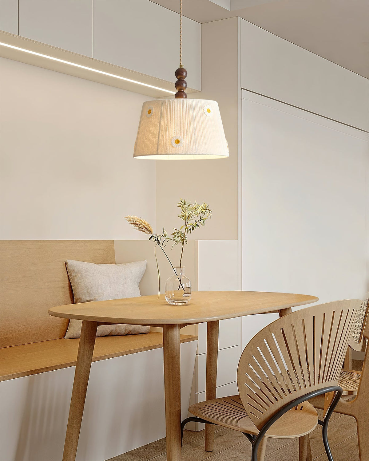 Lytham Pendant Light shown against a dark background to highlight its form.