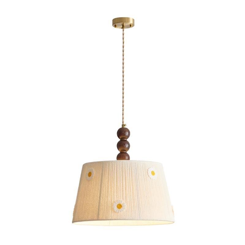 The Lytham Pendant Light turned off, showcasing its handcrafted texture.