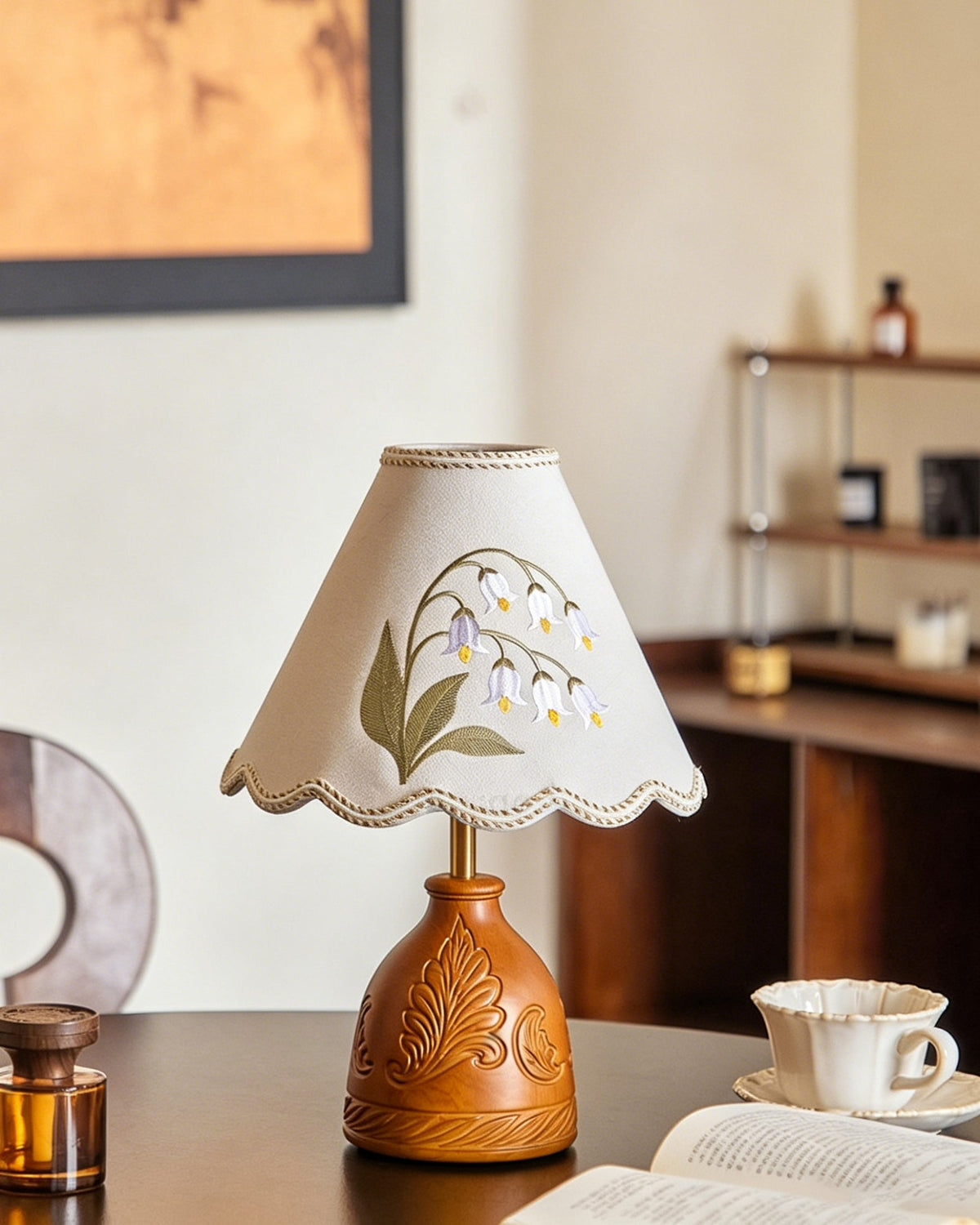 The lamp base showing the natural wood grain and walnut finish.