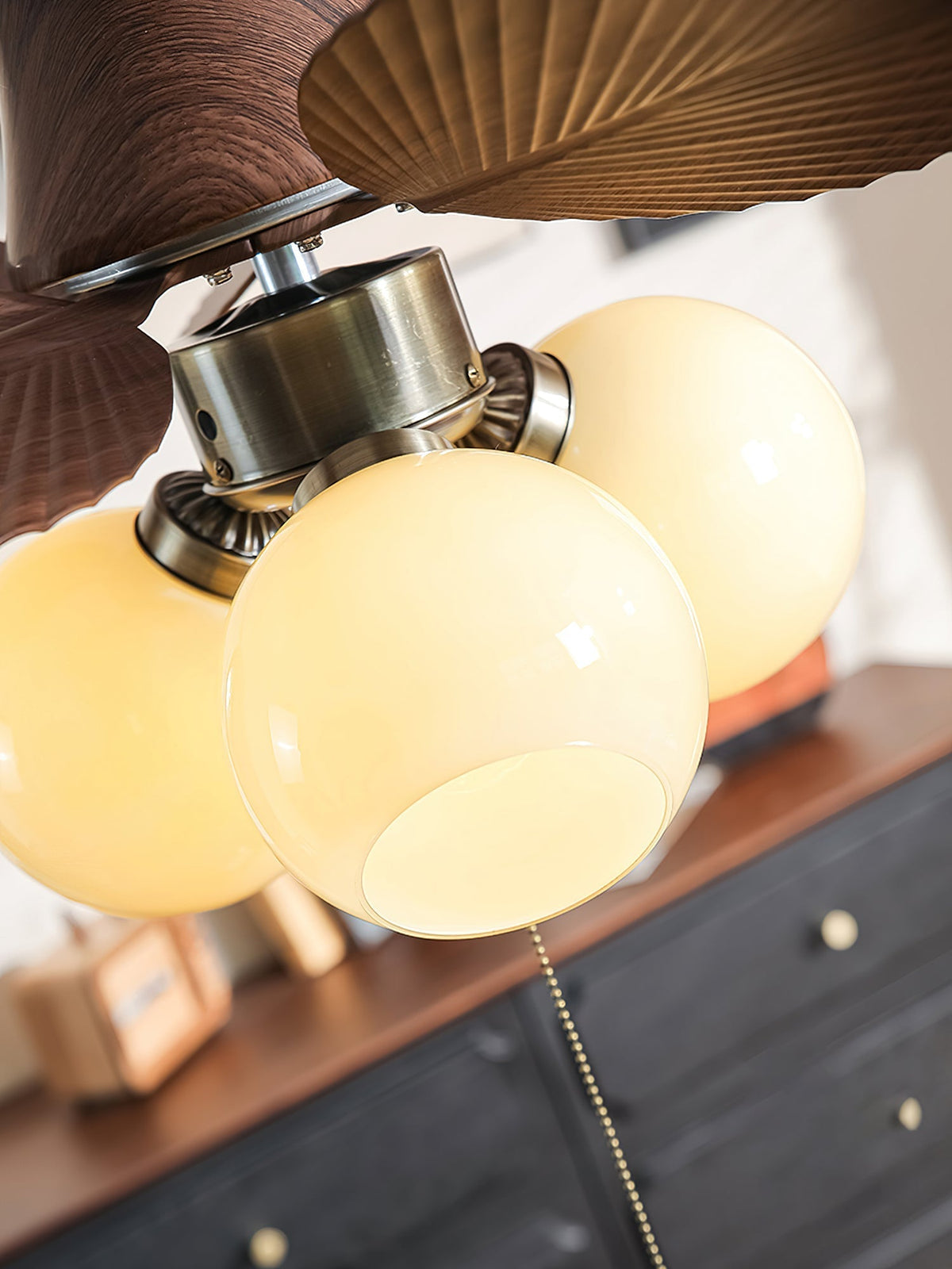 Lifestyle image of the Malibu Ceiling Fan Light in a high-end resort setting.