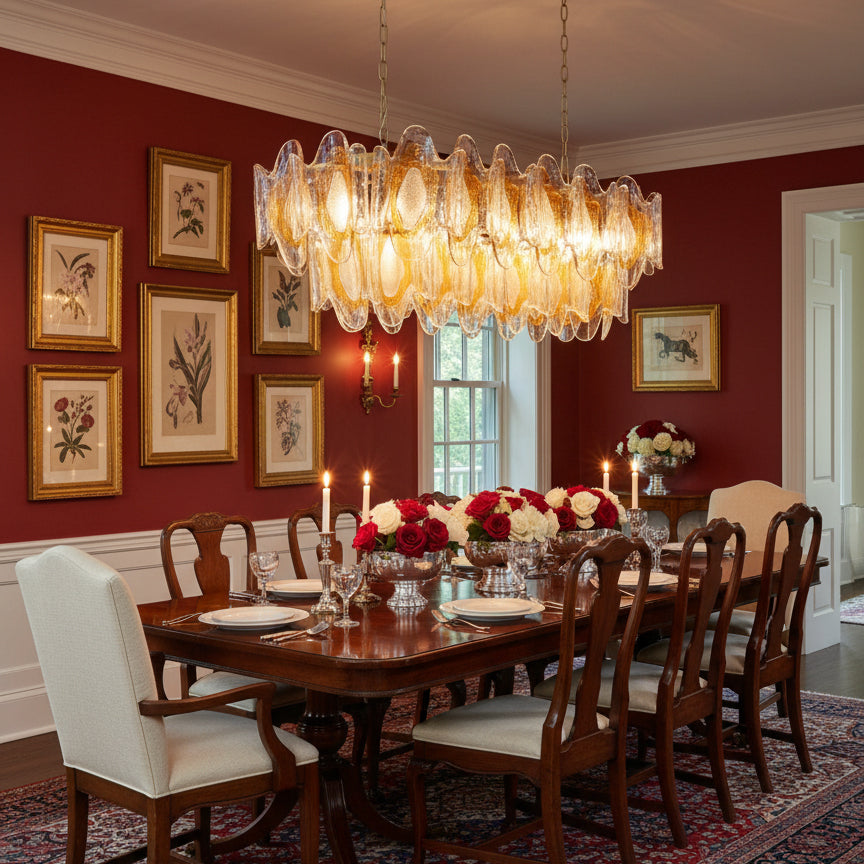 The chandelier installed in a grand entryway with high ceilings.