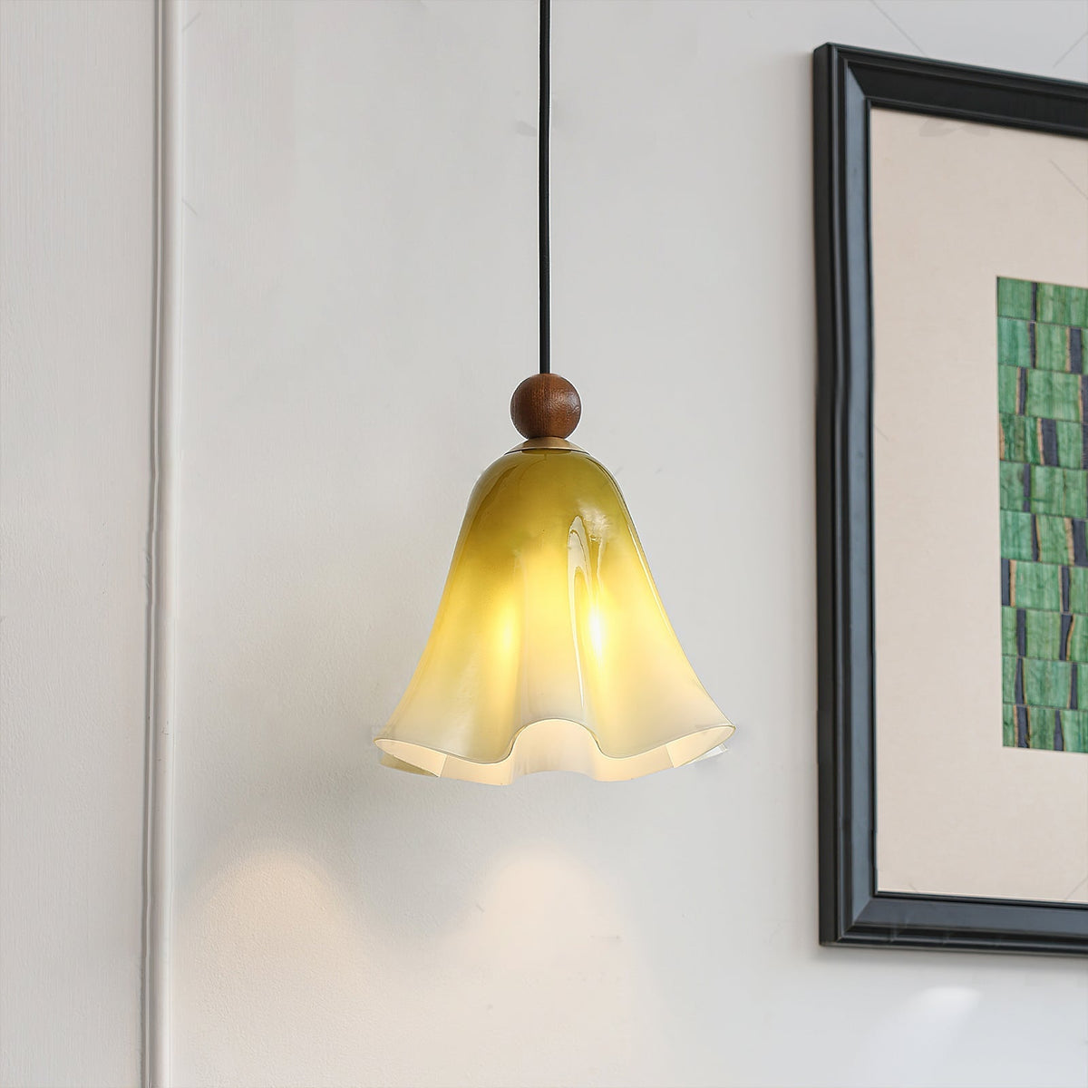 Close-up of the Meblo Pendant Light's wooden accent and metal suspension.