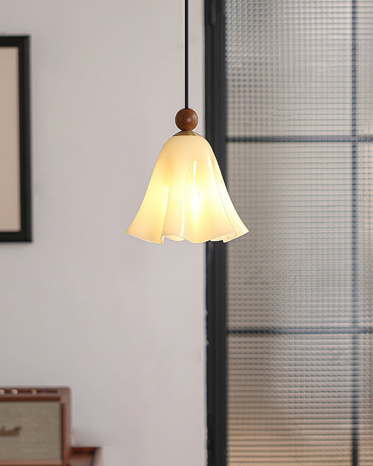 View of the Meblo Pendant Light from below, showing the E14 bulb base.
