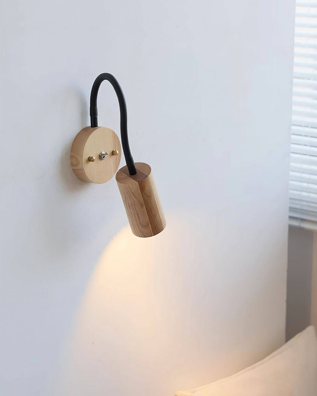 Detail shot of the toggle switch on the Micro Wall Lamp.