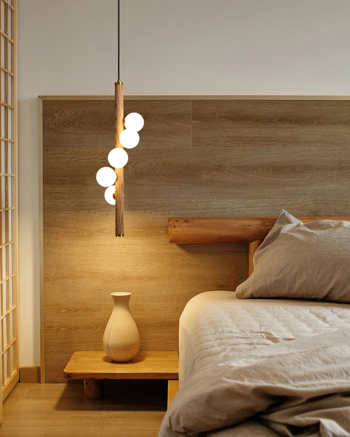 Detail shot of the walnut wood finish on the Miller Pendant Light.